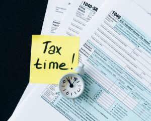 tax documents on black table