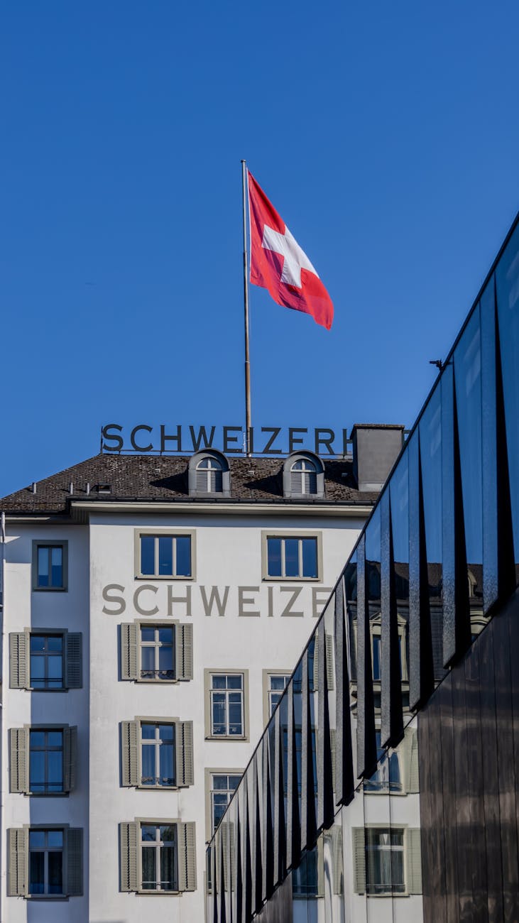 swiss architecture with national flag in lucerne