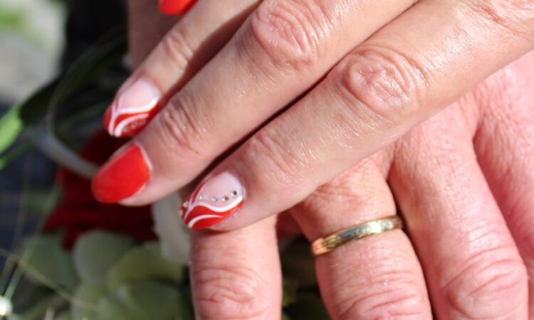 a couple wearing their wedding bands