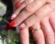 a couple wearing their wedding bands