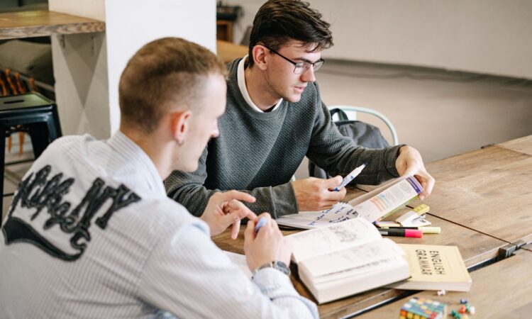 men reading books