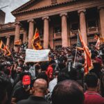 people protesting outside a building
