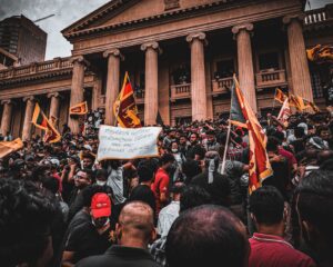 people protesting outside a building