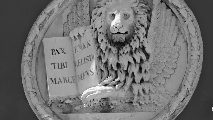 grayscale photo of lion monument