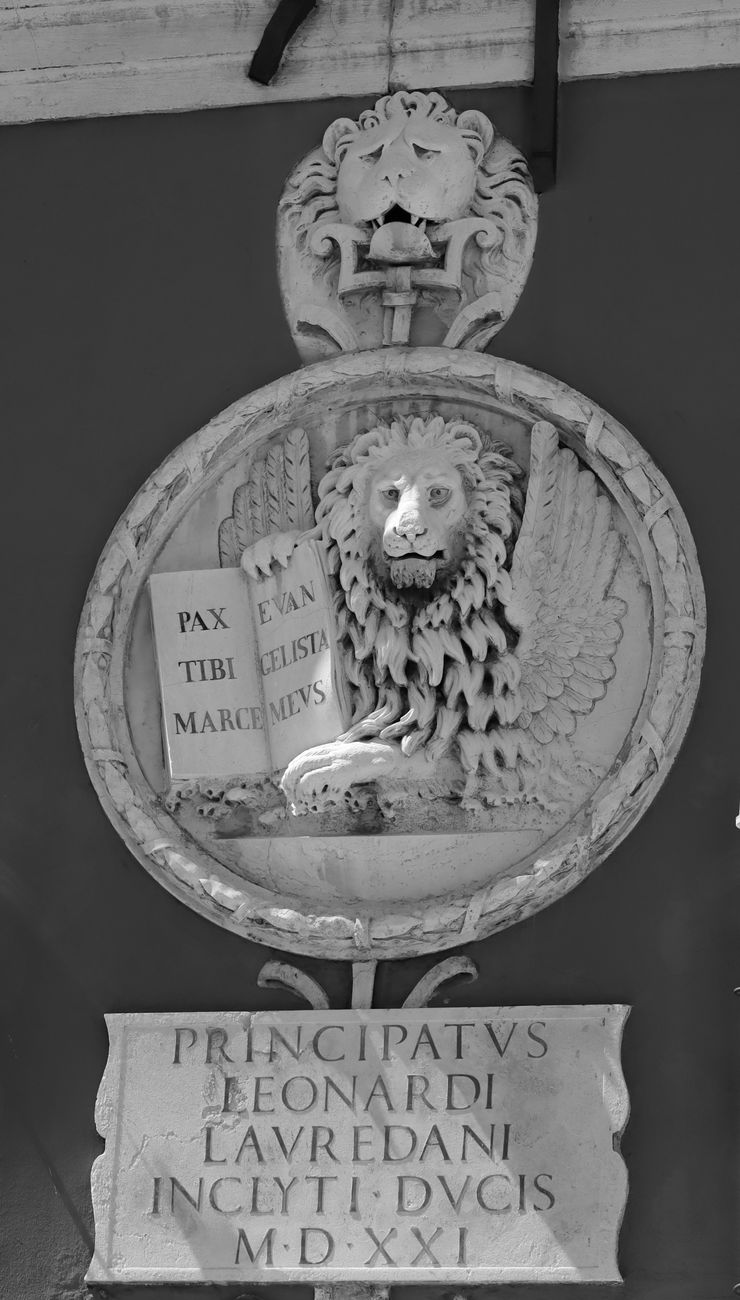 grayscale photo of lion monument