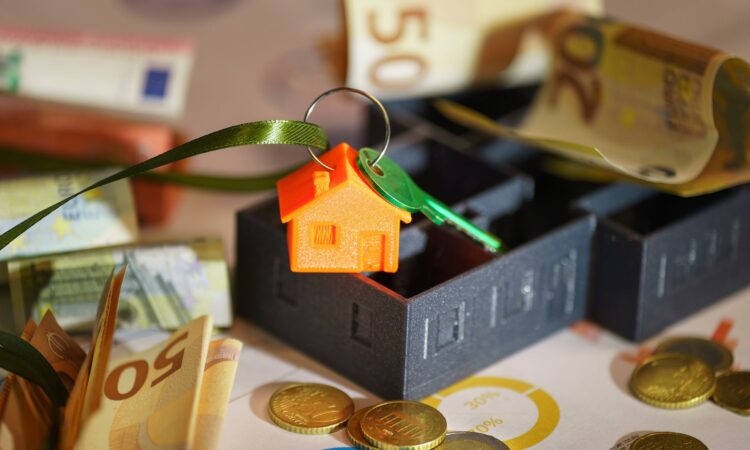 real estate investment and currency exchange concept