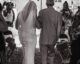 grayscale photo of a bride and her father walking together
